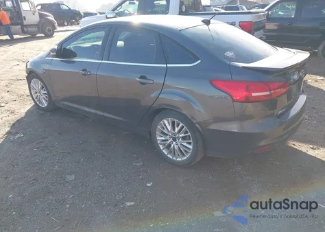 2015 Ford Focus Titanium from USA, damaged, VIN 1FADP3J27FL259029
